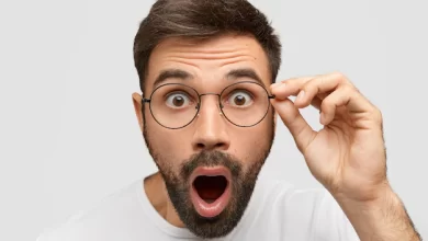 close up portrait stunned bearded young guy drops jaw has bugged dark eyes sees something unbelievable surprising has eyewear isolated white wall people emotions concept 273609 15474